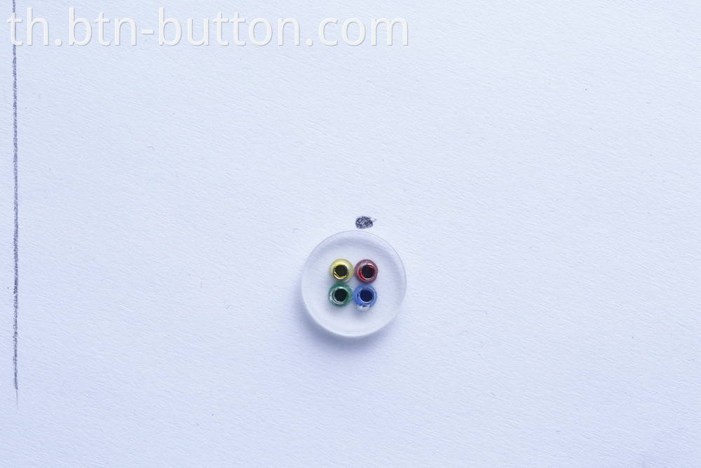 Four-hole color transparent button